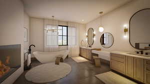 Bathroom with vanity and a washtub