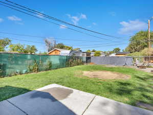 View of yard with a patio area