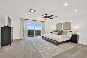 Primary bedroom with balcony