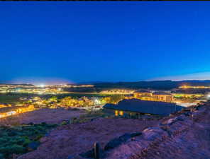 Aerial view at dusk featuring a mountain view