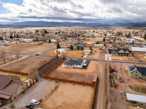 Birds eye view of property with a mountain view