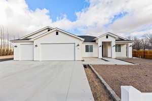 Ranch-style house with a garage