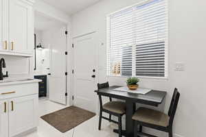 Dining space featuring sink