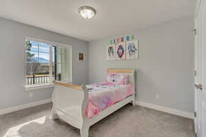 View of carpeted bedroom