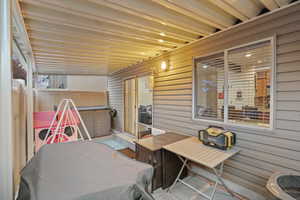 View of patio featuring a jacuzzi