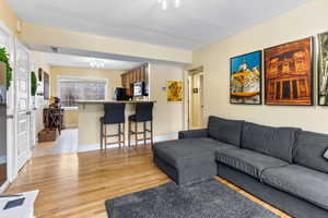 Living room featuring light hardwood / wood-style flooring