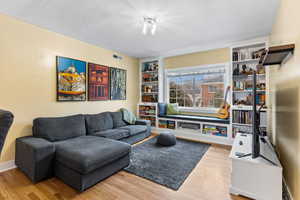 Living room featuring hardwood / wood-style flooring