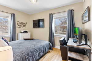 Bedroom featuring light wood-type flooring