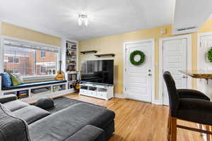 Living room featuring light hardwood / wood-style flooring