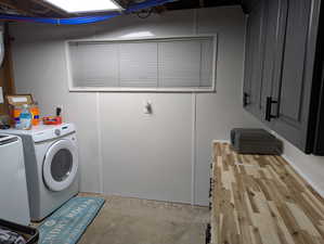 Clothes washing area with washer and clothes dryer