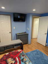 Bedroom featuring light hardwood / wood-style flooring