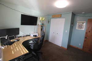 View of carpeted home office