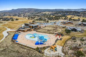 Birds eye view of property with a mountain view