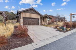 View of front of home featuring a garage