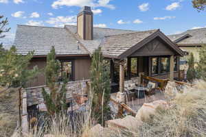 Rear view of property with a patio