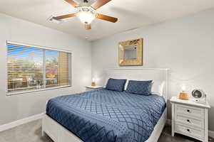 Bedroom featuring carpet floors and ceiling fan