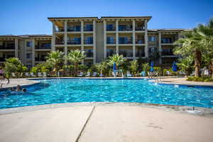 View of swimming pool featuring a patio