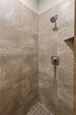 Details with a tile shower