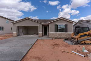 View of front of home with a garage