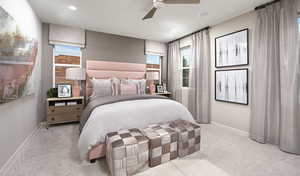 Carpeted bedroom featuring ceiling fan