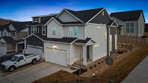 View of front of home featuring a garage