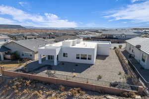 Drone / aerial view with a residential view and a mountain view