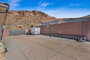 View of patio / terrace with a mountain view