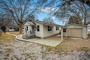 View of front of property with a garage