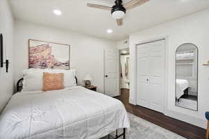 Bedroom featuring ceiling fan, wood-style flooring, and a closet