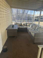 Unfurnished sunroom with a healthy amount of sunlight