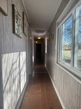 Hall featuring dark hardwood / wood-style floors