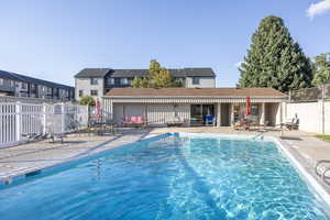 View of pool with a patio area