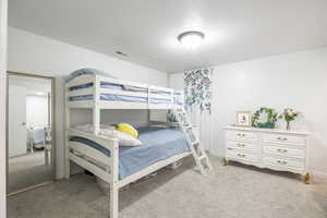 Bedroom featuring carpet