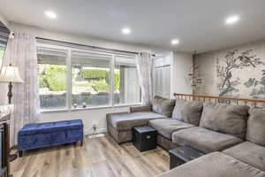 Living room featuring light hardwood / wood-style floors