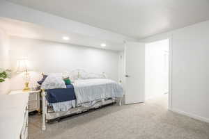 Bedroom featuring carpet flooring