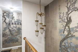 Hallway with hardwood / wood-style flooring