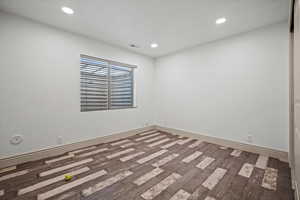 Unfurnished room with wood-type flooring