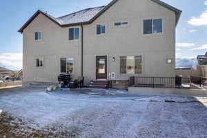 Rear view of house with a mountain view