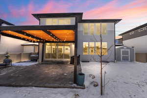 Backyard with hot tub, pergola, Tuff Shed, & built in gas firepit