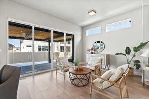 Sitting room featuring light hardwood / wood-style floors