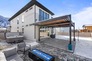 Backyard with hot tub, pergola, Tuff Shed, & built in gas firepit