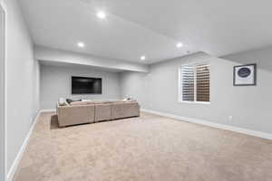 Basement Family Room with wet bar & bath rough plumbed in, & a huge storage room