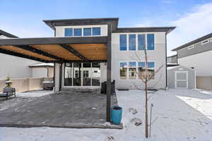 Backyard with hot tub, pergola, Tuff Shed, & built in gas firepit