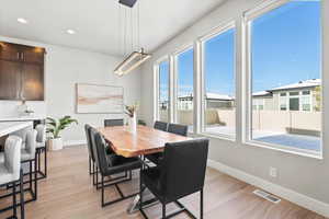 Dining room featuring light hardwood / wood-style floors