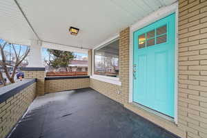 Entrance to property with covered porch