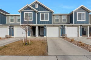 View of front of property with a garage