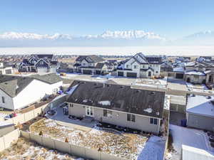 Snowy aerial view with a mountain view