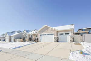 View of front facade featuring a garage