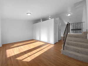 Interior space with hardwood / wood-style floors