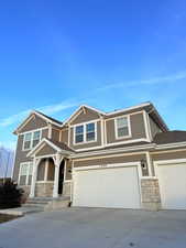 View of front facade with a garage